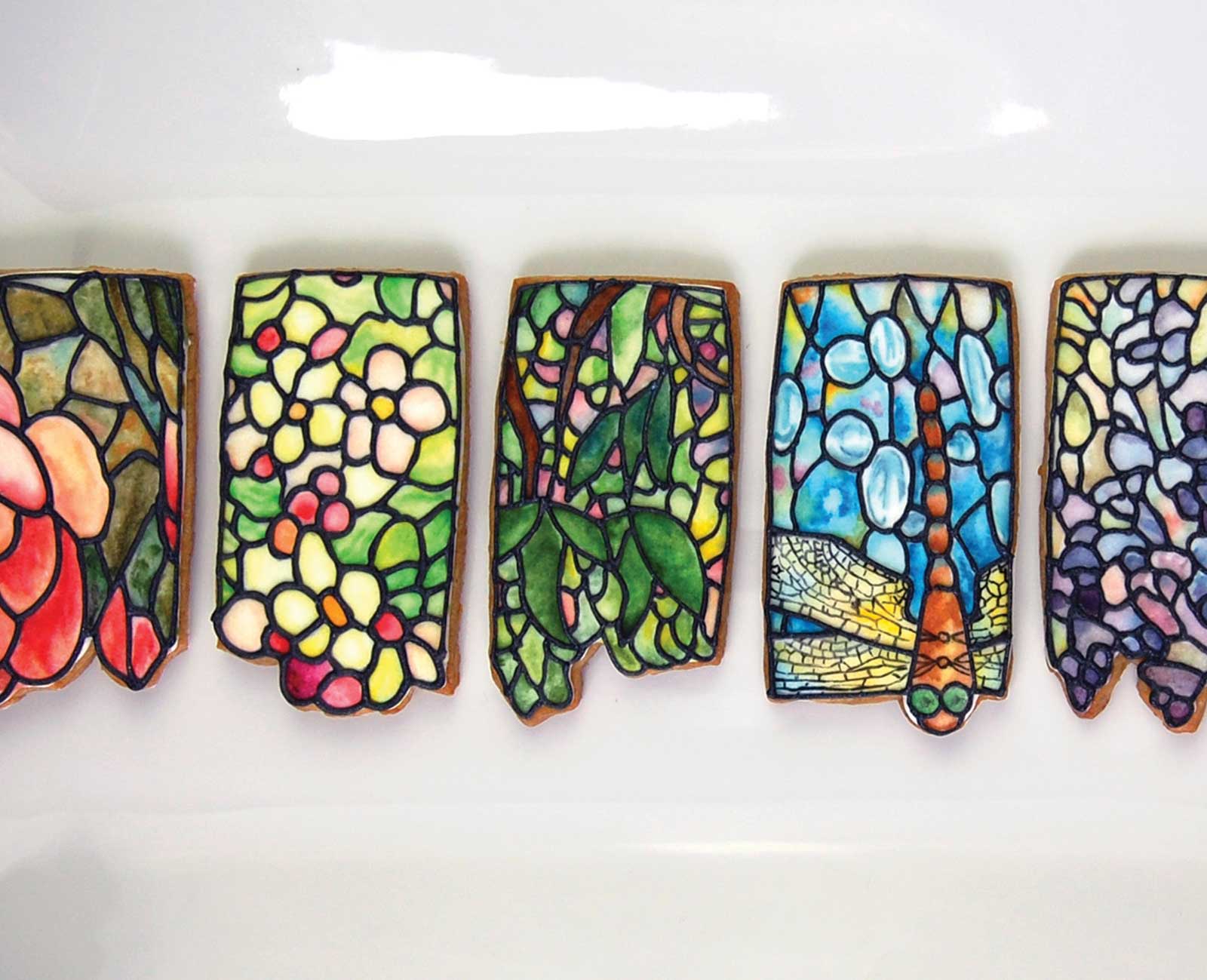 Shakespeare scholar Ella Hawkins bakes and designs intricately decorated cookies (or biscuits) that take a page from antiquarian books and medieval manuscripts.