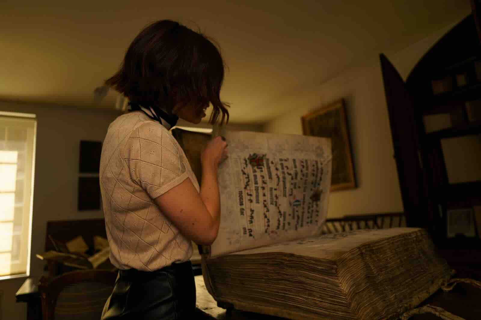 Erin examining a mid-15th century illuminated choir manuscript