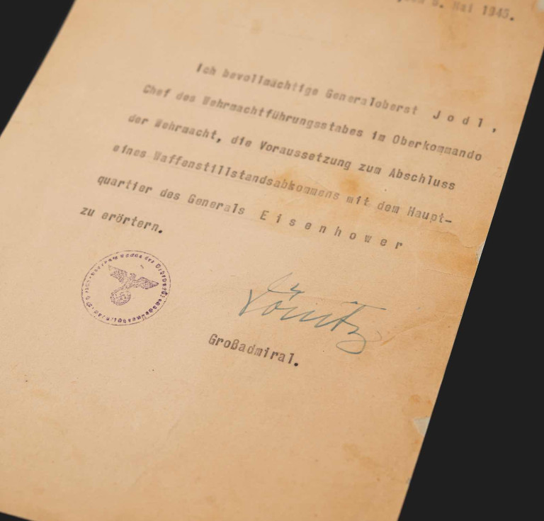 Document signed by Reich President Karl Dönitz authorizing the start of surrender negotiations with Allied forces
